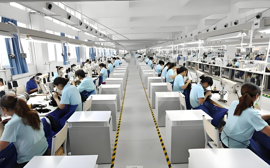China Wig Factory production workshop, workers making human & synthetic hair wigs on assembly line
