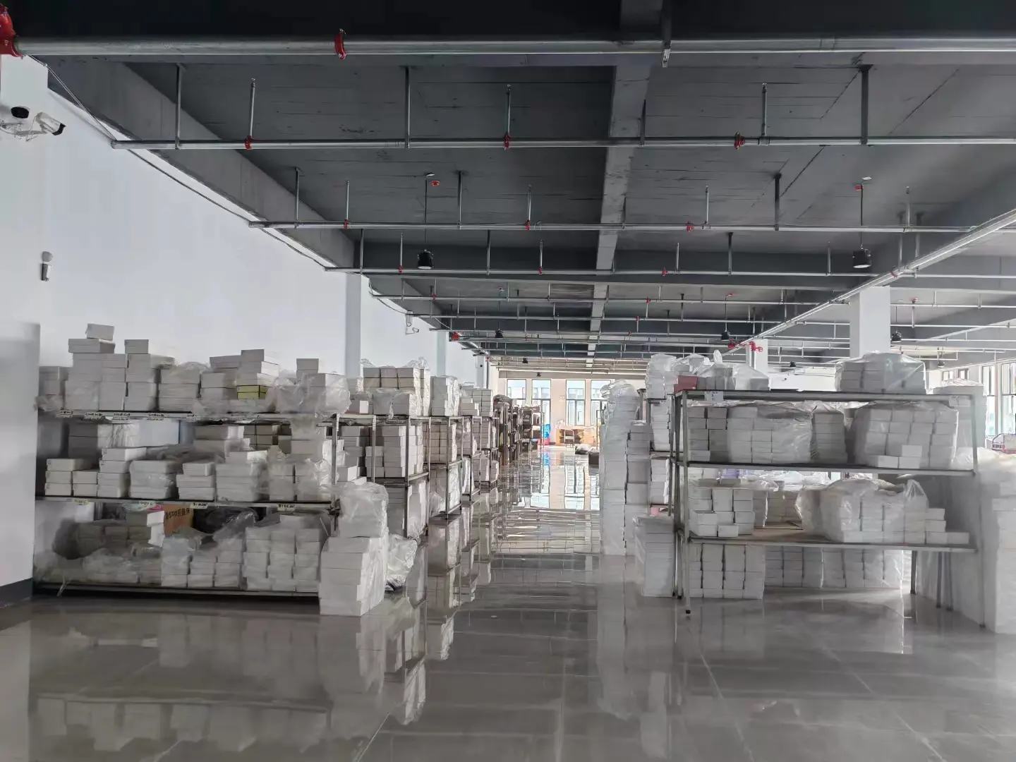 Raw hair material storage area at Dejun Hair factory 