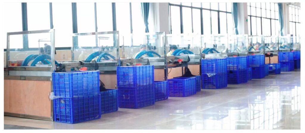 China Wig Factory Gallery: production workshop, workers making human & synthetic hair wigs on assembly line